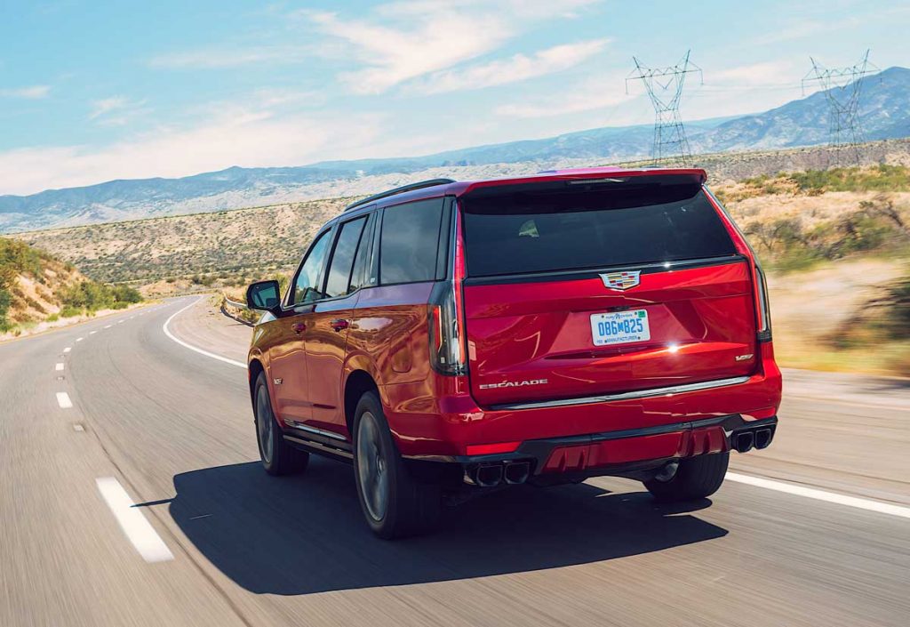 Rear shot of the 2023 Cadillac Escalade-V driving down the highway in Phoenix, Arizona.