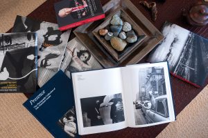 Judy has ample books on photography, including one on her own collection. Photo by Jerry Rabinowitz