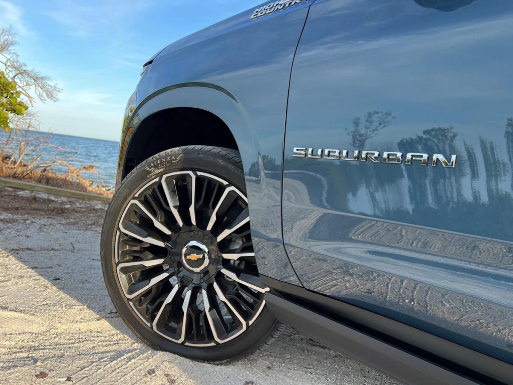 Towering 24-inch rims. Photo by Howard Walker
