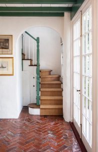 Shiverick retained the original glazed brick herringbone floors in the foyer. Photo by Jerry Rabinowitz