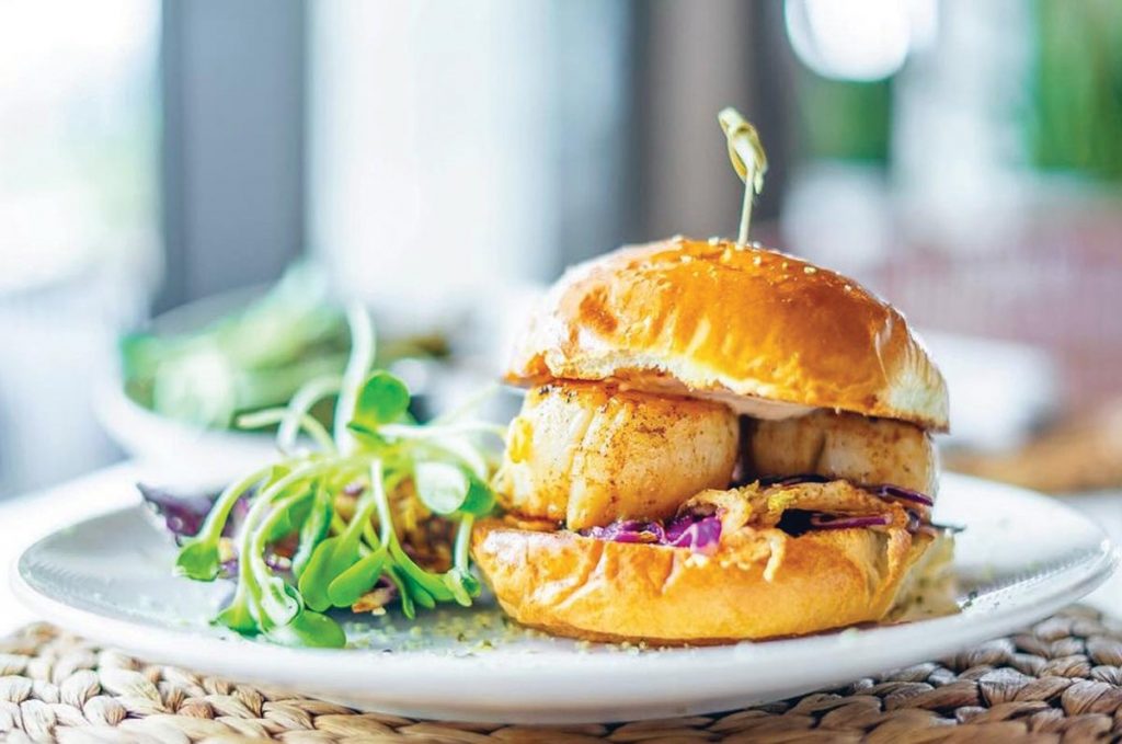 Scallop po’boy burger at Cósta. Photo courtesy of Coton Stine/Cósta