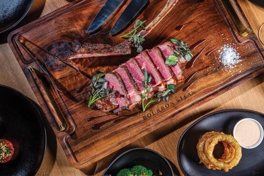 Bourbon Steak New York steak. Photo by Rey Lopez