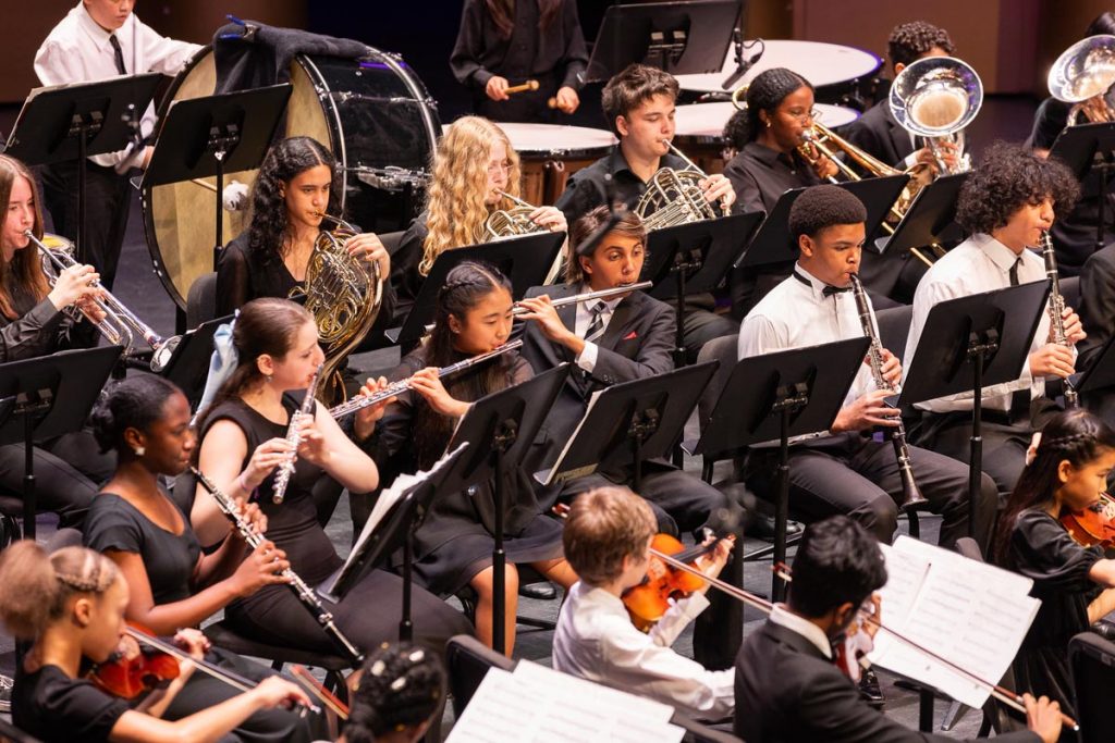 The ninth and tenth grade High School Concert Band performs at the Spotlight on Young Musicians. Photo by Mary Stucchi