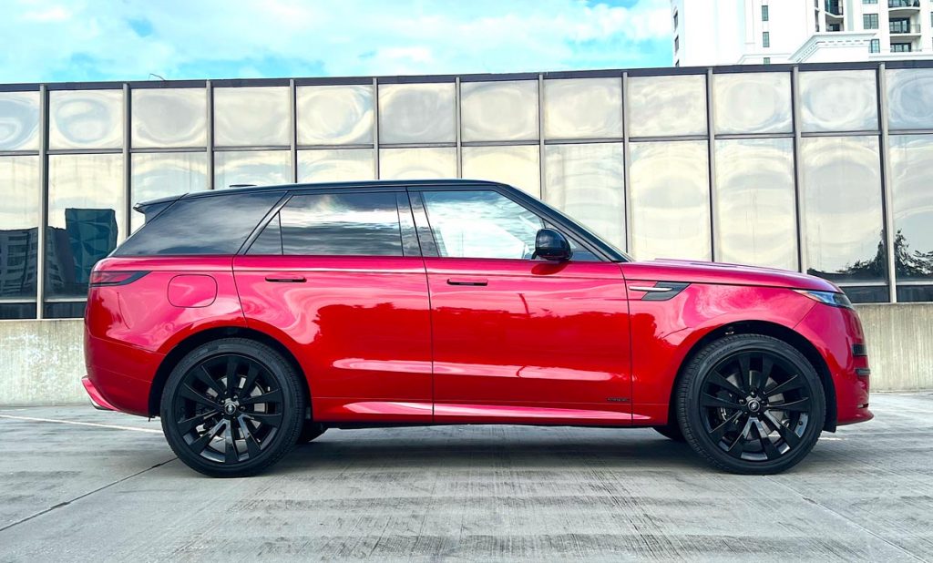 The Range Rover Sport Autobiography boasts a towering waistline, sloped coal-black roof, cat's-eye LED headlights, and 23-inch gloss-black rims. Photo by Howard Walker