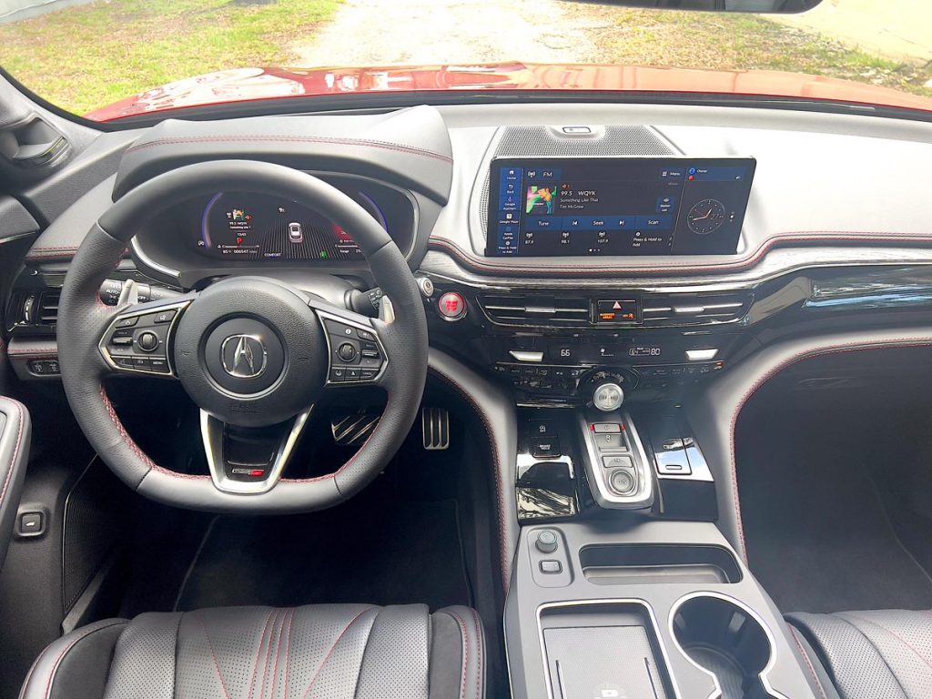 Navigate the 12.3-inch touchscreen on the dash top. Photo by Howard Walker