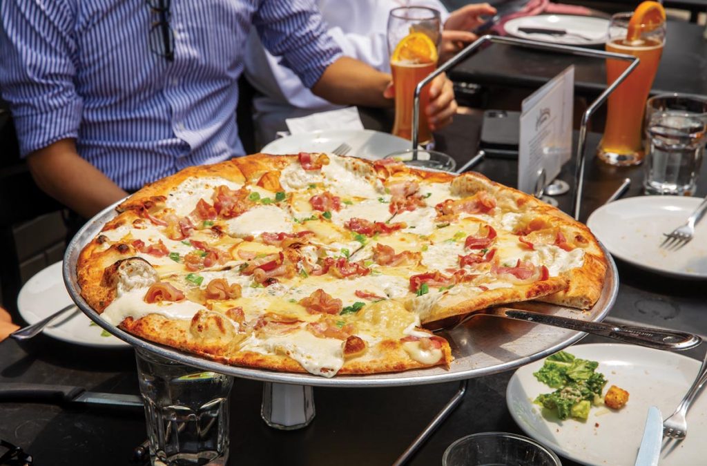 Savor both customizable and signature pies. Photo by Biz Jones, courtesy of Juliana’s Pizza