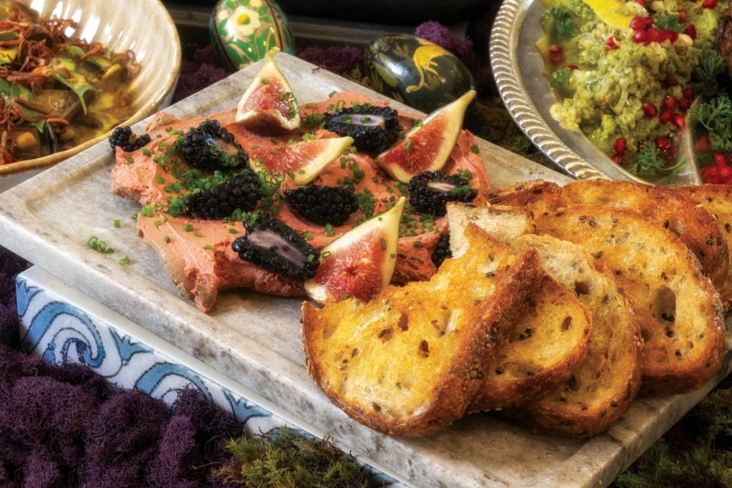 Chef Pushkar Marathe created a global-inspired Easter feast, featuring chicken liver pâté garnished with figs and served with sourdough. Photo by Jerry Rabinowitz