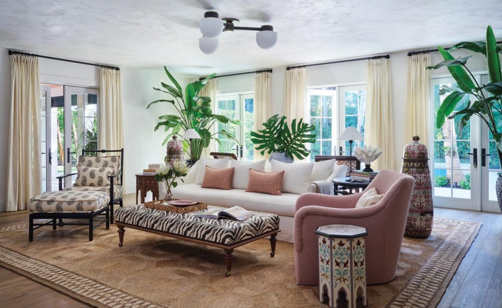 In the family room, fabrics by Peter Fasano appear on a custom ottoman as well as the Rush chair and ottoman from Aesthetic Decor. Photo by Carmel Brantley