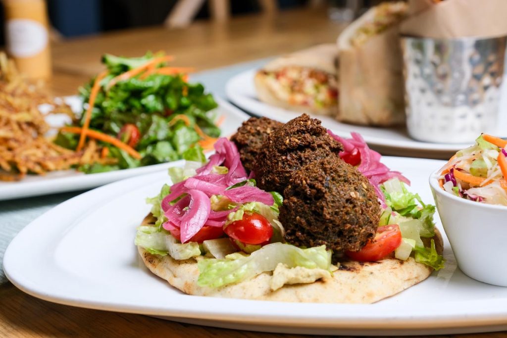 Farmer’s falafel on house-made naan. Photo courtesy of Farmer’s Table/Kip Hunter Marketing