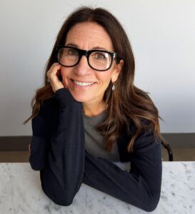 Bobbi Brown dons the B.B. Queen in Glossy Black. Photo courtesy of Caddis