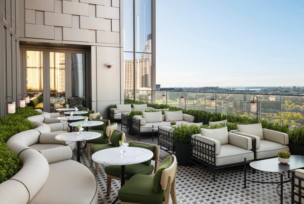 Sip alfresco at the Long Bar & Terrace. Photo courtesy of Raffles Boston
