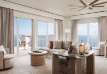 Suite designs lean on organic materials and the sea-and-sand palette beyond the massive-scale windows. Photo courtesy of The Ritz-Carlton Key Biscayne, Miami
