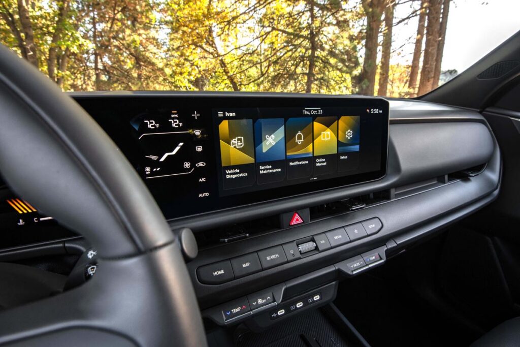 The thin-panel 12.3-inch digital display in front of the driver that flows into a 12.3-inch central touchscreen. Photo by Kia